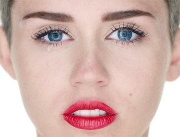 Miley Cyrus Releases New Music Video for 'Wrecking Ball' Miley Cyrus Releases New Music Video for 'Wrecking Ball'