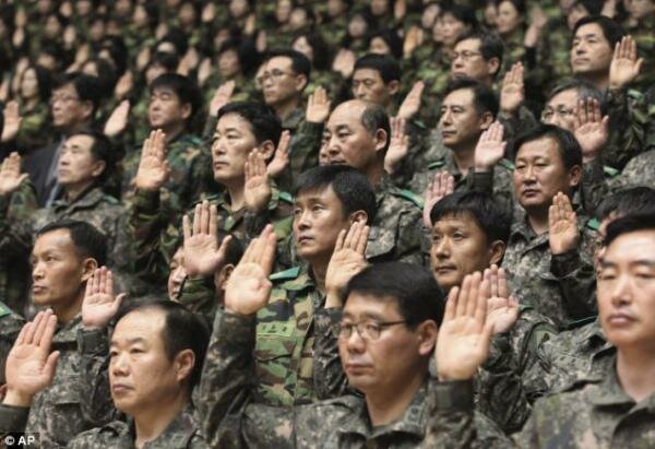 West Slams North Korea After Madman Dictator Is Pictured Brandishing a Gun