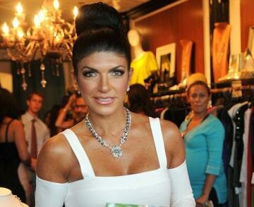 Teresa Giudice Ditches Smart Suit for Tacky White Dress as She Heads to Book Launch Teresa Giudice Ditches Smart Suit for Tacky White Dress as She Heads to Book Launch