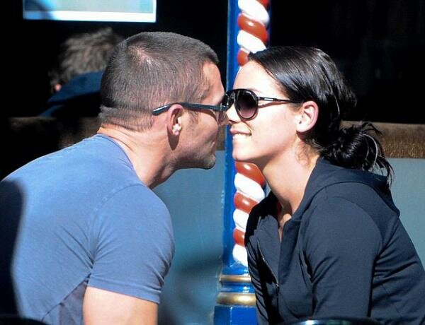 Dannii Minogue's ex-boyfriend Kris Smith puts on a steamy PDA with model girlfriend Maddy Smith over breakfast